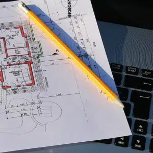 Laptop and building plans